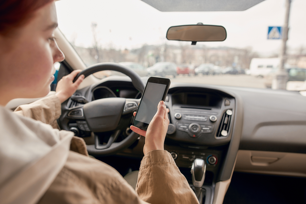 Distracted Young Female Driver